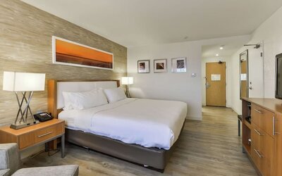 Day use room with TV, sofa and private bathroom at DoubleTree By Hilton Kitchener.