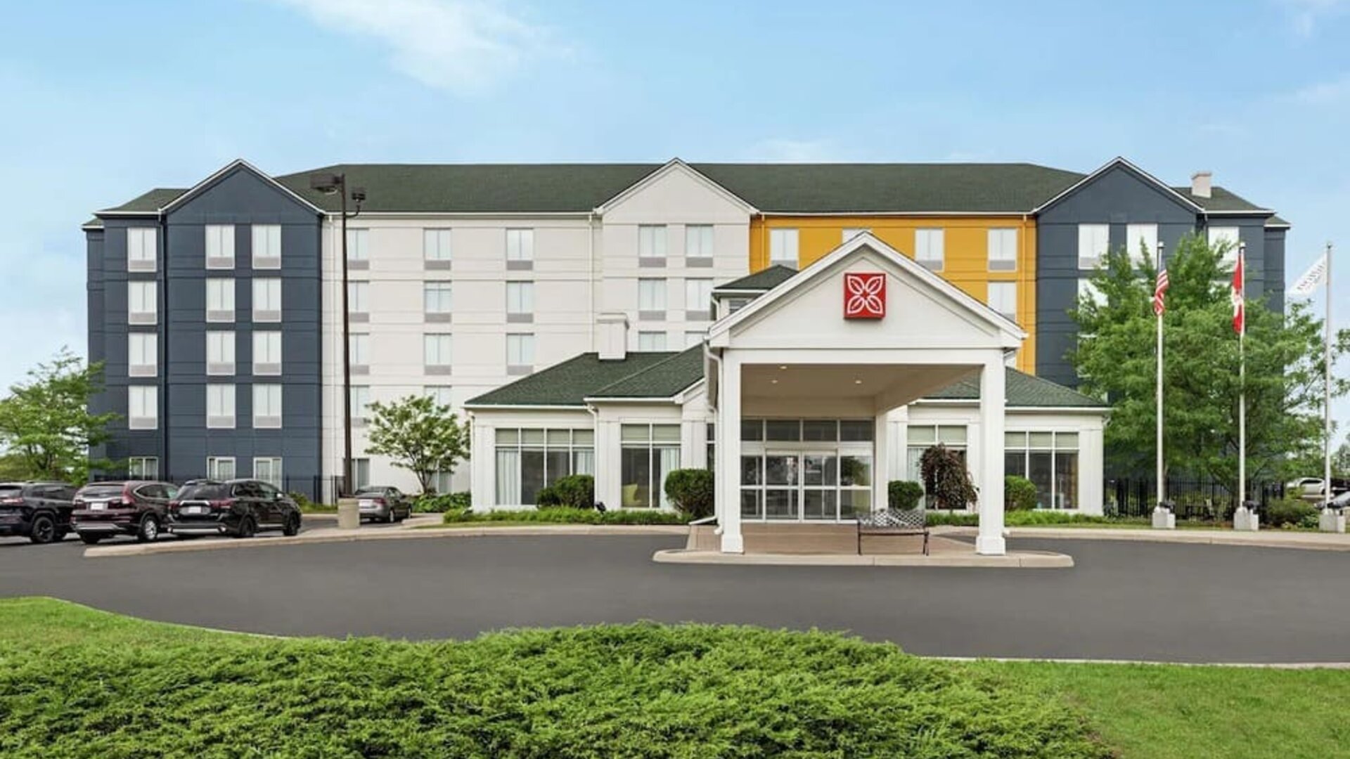 Hotel exterior and parking area at the Hilton Garden Inn Kitchener/Cambridge.