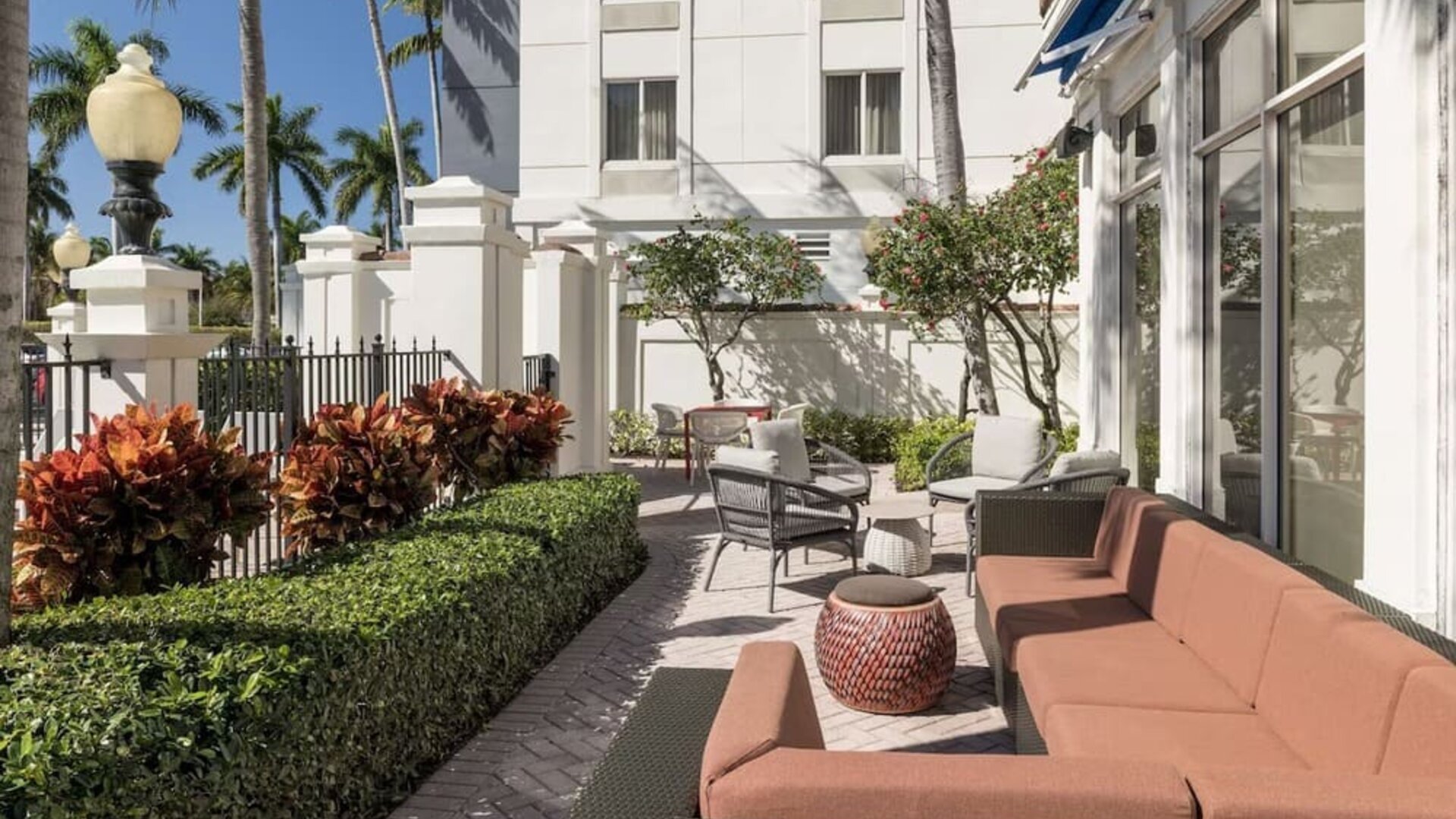 Outdoor seats available at Hilton Garden Inn Boca Raton.