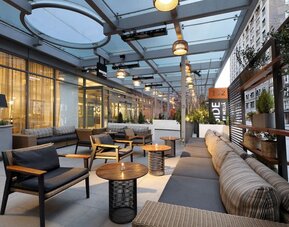 Veranda with ample seats at Innside By Melia New York Nomad.