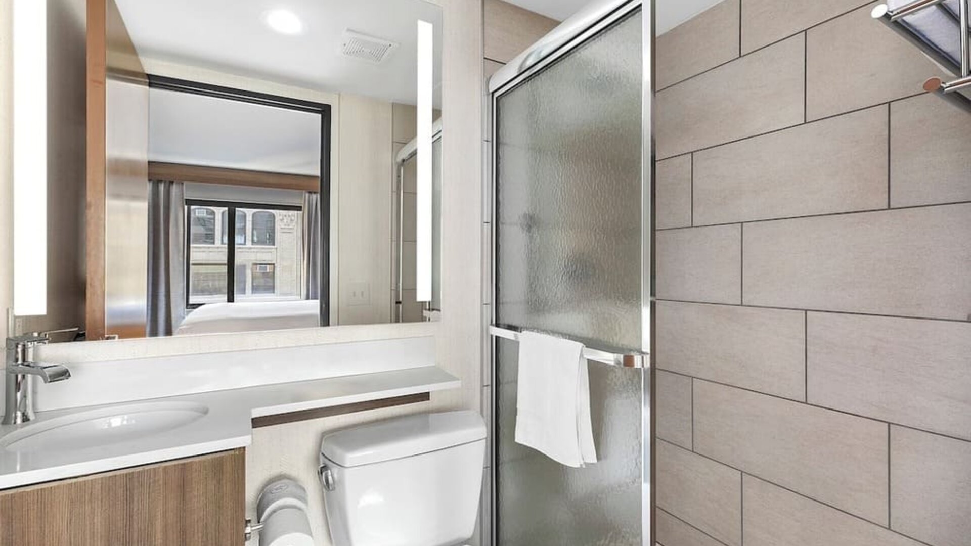Guest bathroom with shower at Holiday Inn Manhattan 6th Ave - Chelsea.
