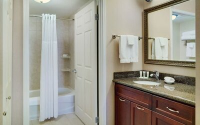 Private guest bathroom at Staybridge Suites Oakville-Burlington.