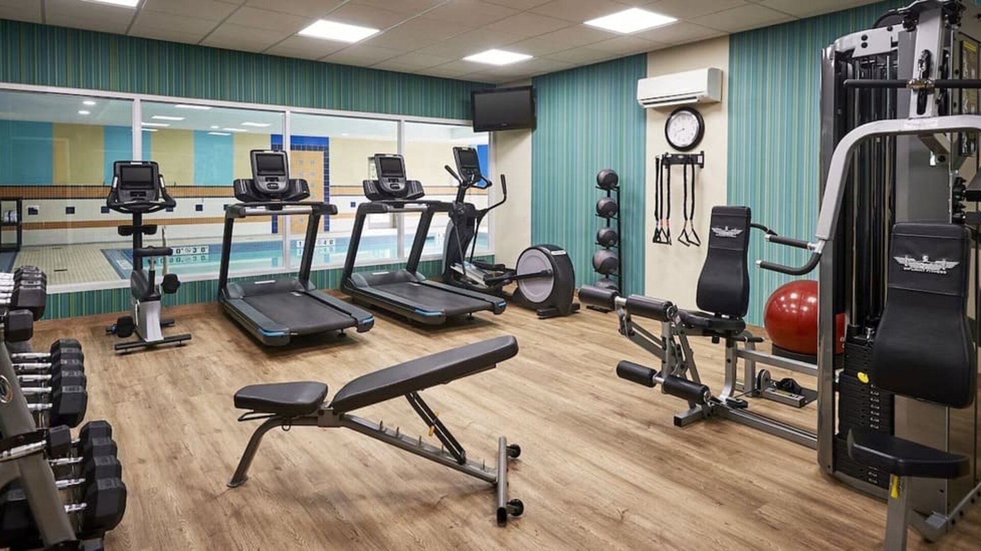 Fully equipped fitness center at Staybridge Suites Oakville-Burlington.