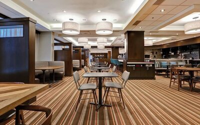 Dining area with comfortable seating perfect for co-working at Four Points By Sheraton Toronto Mississauga.