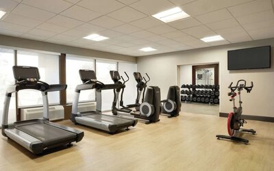 Fully equipped fitness center at DoubleTree By Hilton Hotel Toronto Airport West.