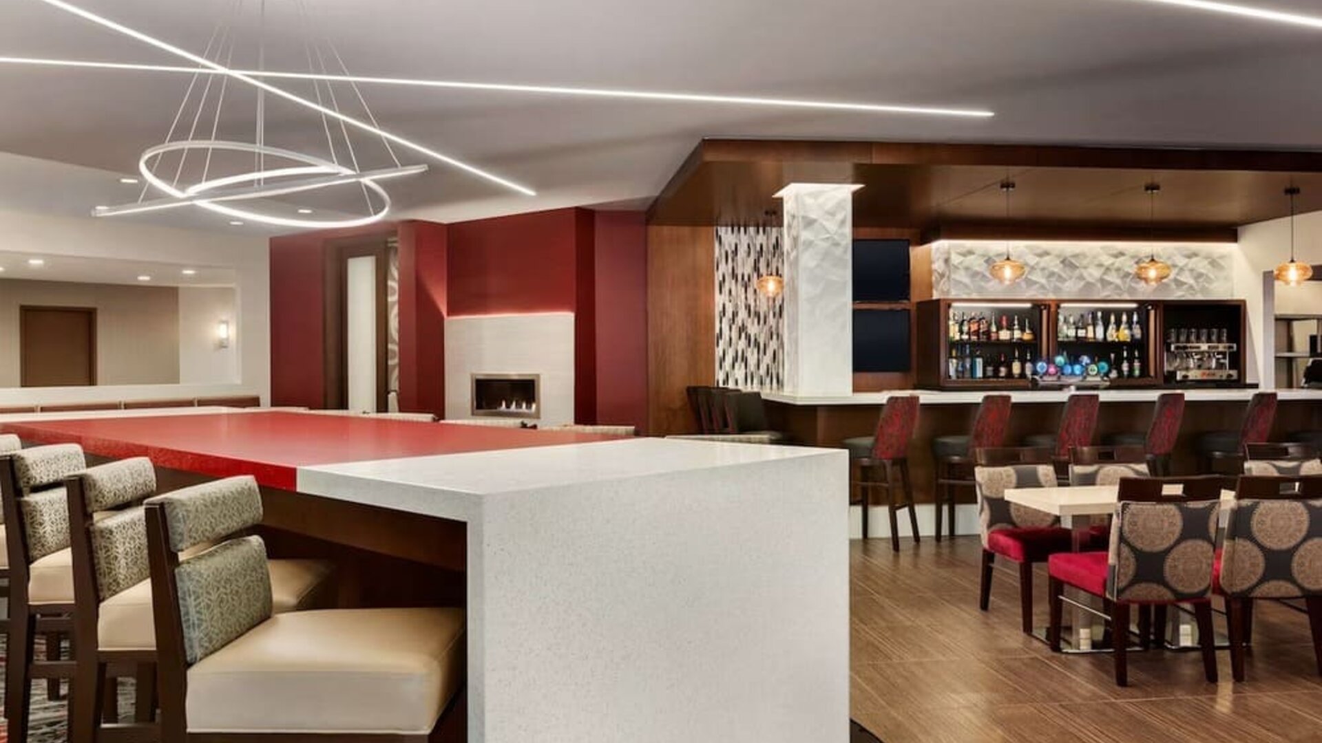 Stylish hotel bar with comfortable seating at DoubleTree By Hilton Hotel Toronto Airport West.