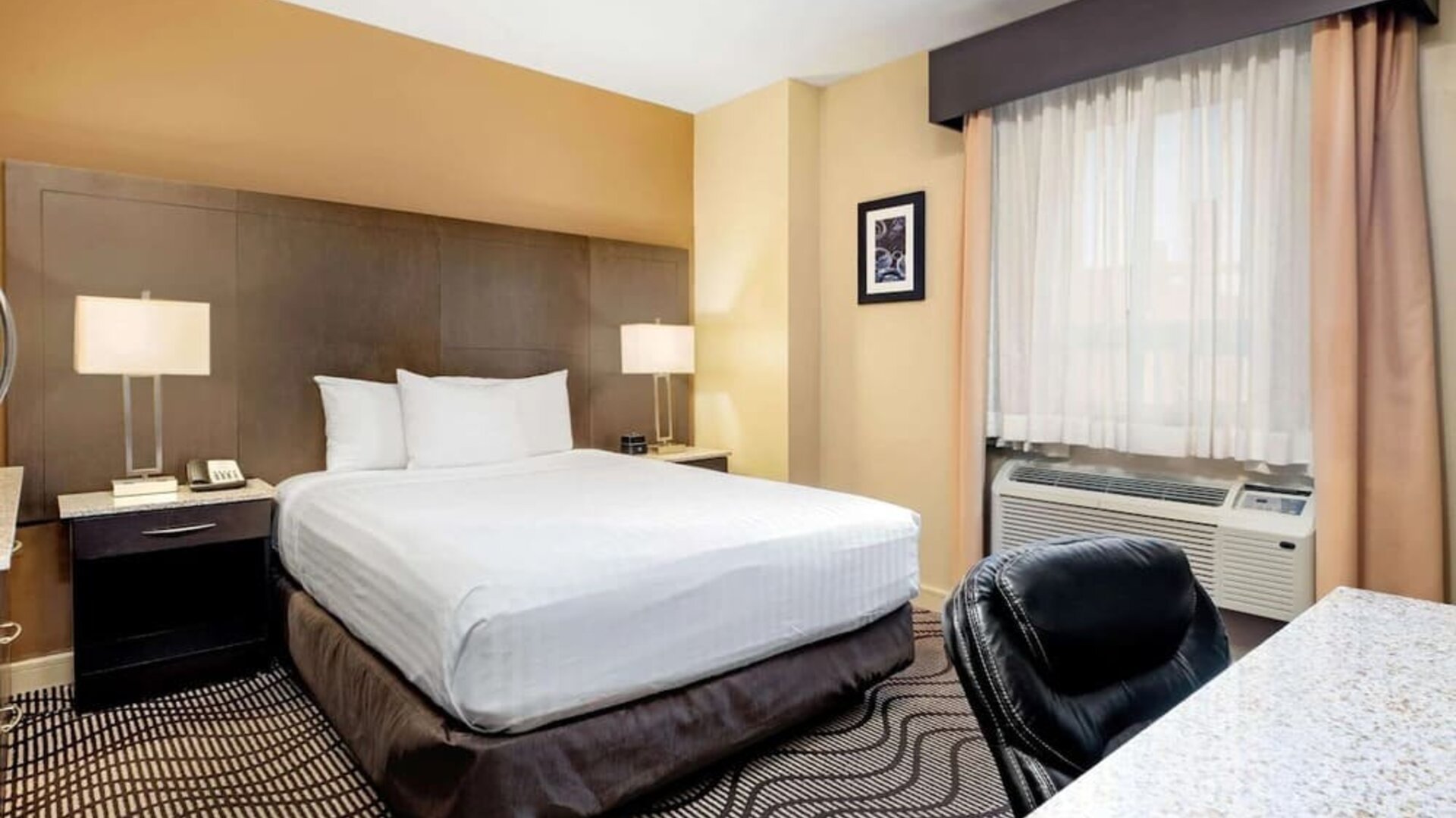 Day use room with work desk and private bathroom at La Quinta Inn & Suites By Wyndham Oshawa.