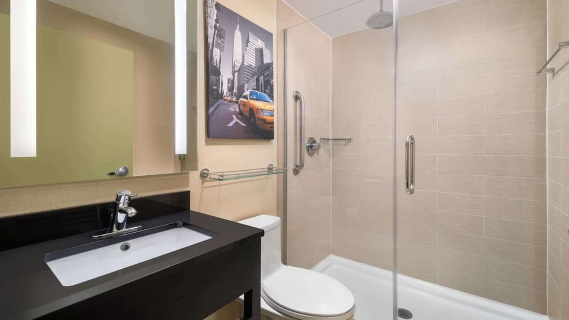Guest bathroom with shower at Best Western Premier Herald Square.