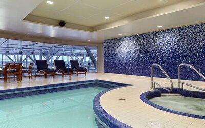Relaxing indoor pool at Fairmont Vancouver Airport - YVR Terminal Hotel.