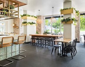 Dining area perfect for coworking at YVE Hotel Miami.