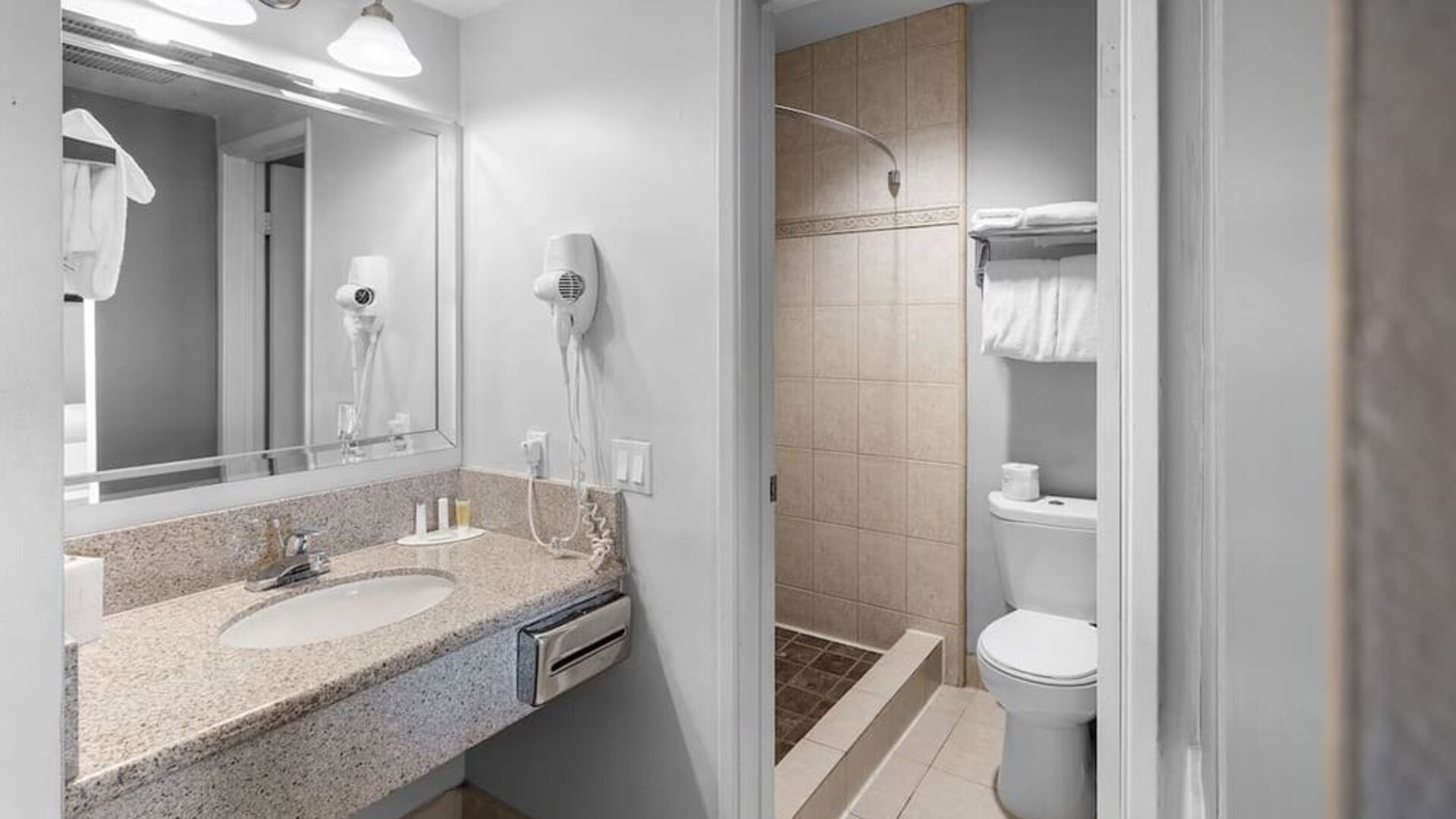 Guest bathroom with shower at The Live Hotel.