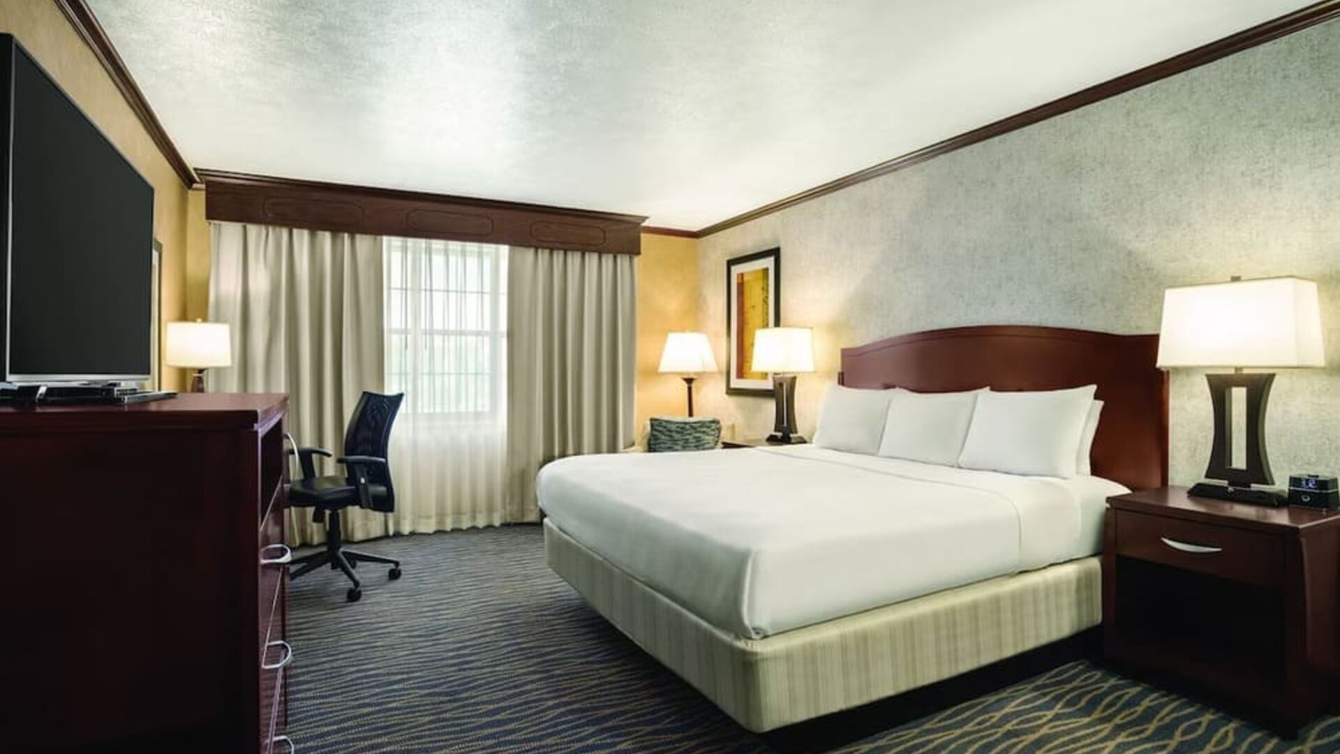 Day use room with work desk at Radisson Hotel Salt Lake City Airport.