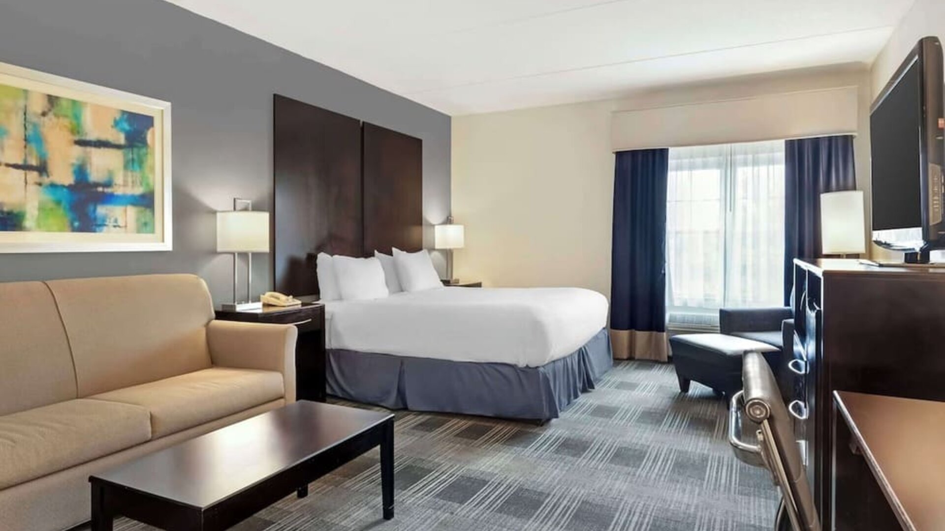 Day use room with sofa at Best Western Hartford Hotel & Suites.