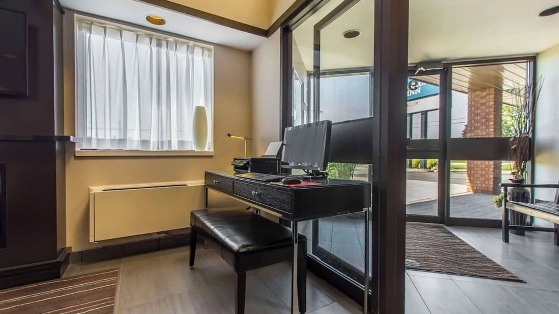 Lobby workspace with computer and printer at Comfort Inn Yarmouth.