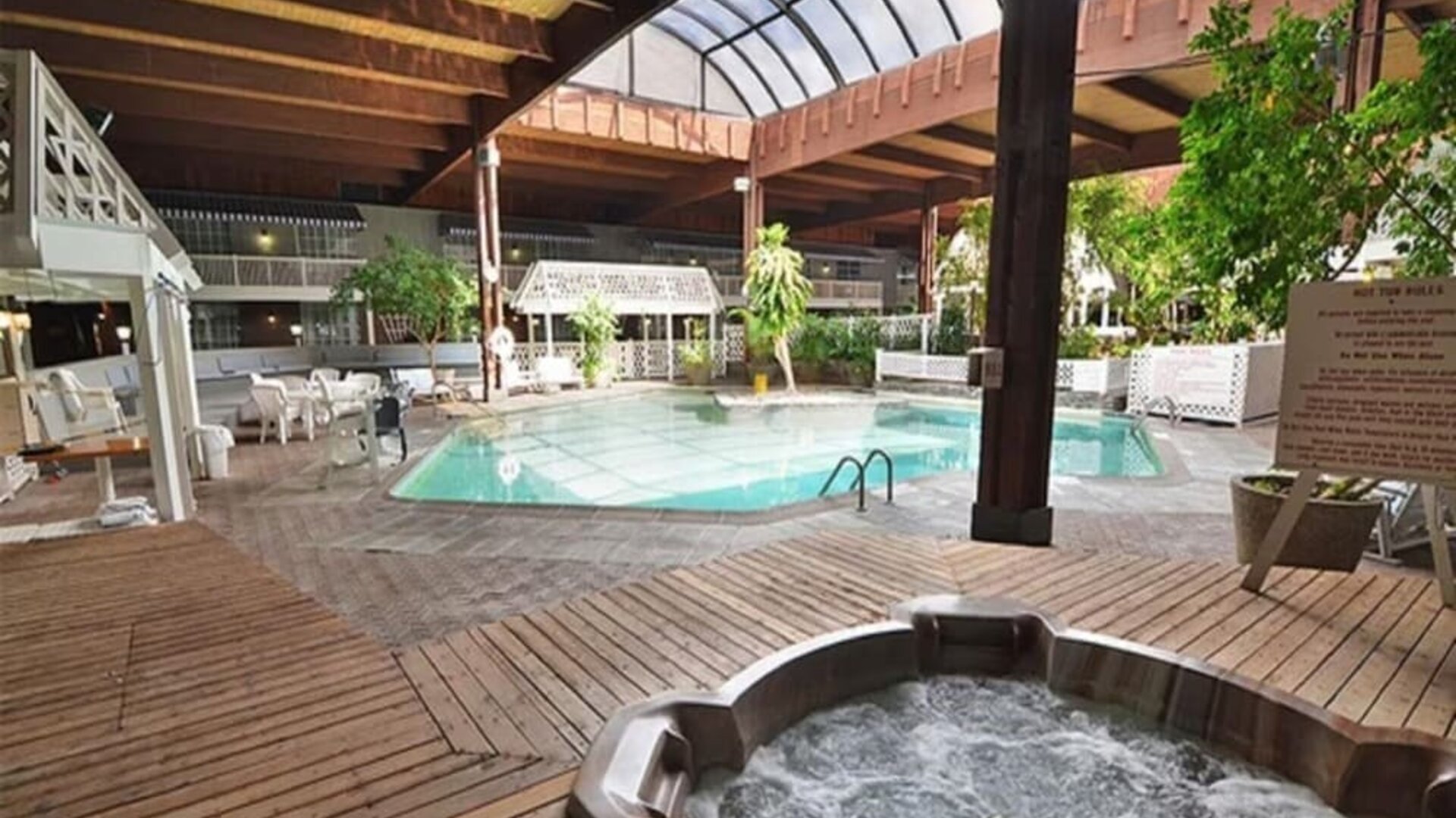 Indoor pool and spa tub at Sturbridge Host Hotel.