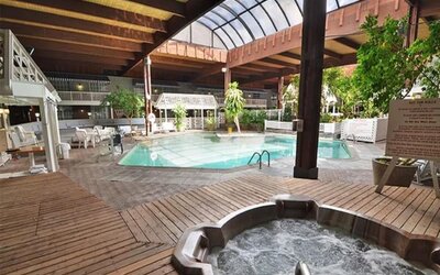 Indoor pool and spa tub at Sturbridge Host Hotel.