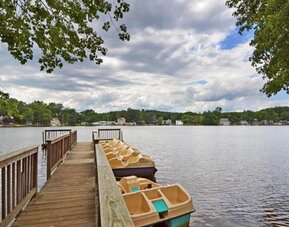 Paddle boats in lake at Sturbridge Host Hotel.