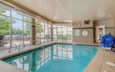 Refreshing indoor pool at Cambria Suites Denver Airport.