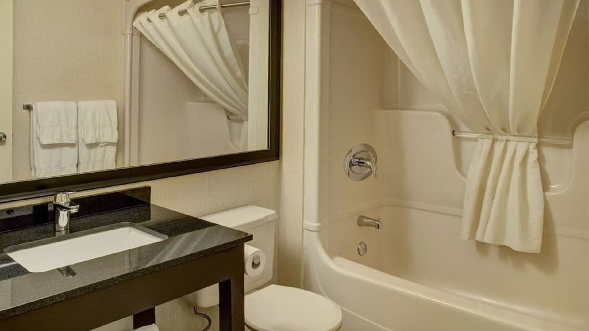 Private guest bathroom at Comfort Inn Cobourg.