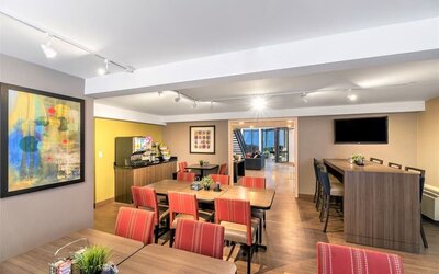 Dining area with comfortable seating perfect for co-working at Comfort Inn Dryden.