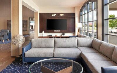 Comfortable lobby lounge perfect for co-working at Courtyard By Marriott Waterloo St. Jacobs.