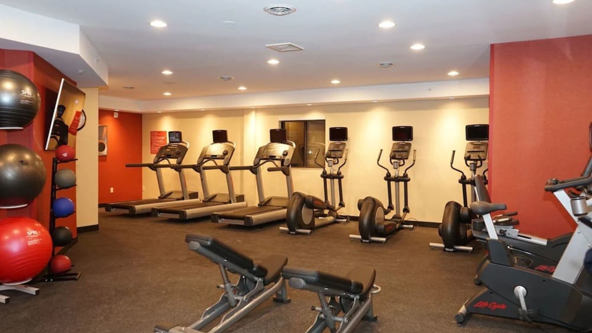 Fully equipped fitness center at TownePlace Suites By Marriott London.