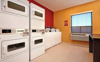 Laundry room at TownePlace Suites By Marriott London.