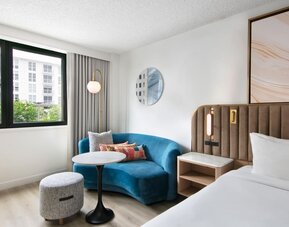 Day use room with lounge area at Sonesta Miami Airport.