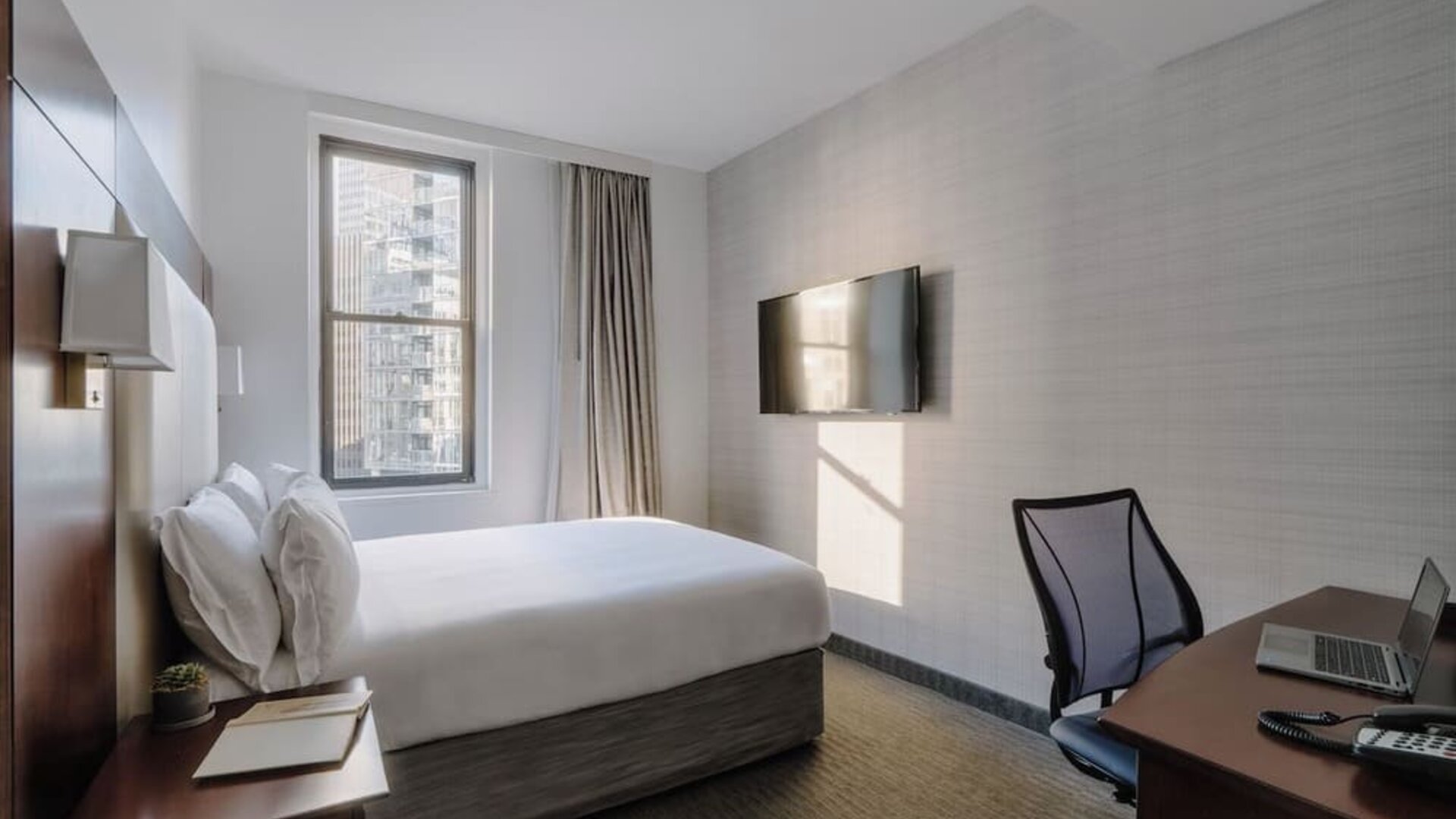 Day use room with work desk at Club Quarters Hotel Wacker At Michigan.