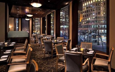 Dining area with comfortable seating, perfect for co-working at Hyatt Regency Vancouver.