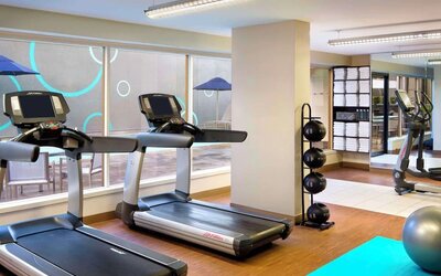 Fully equipped fitness center at Hyatt Regency Vancouver.