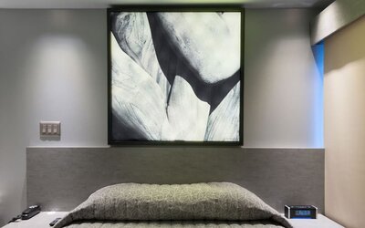 King bed at Le Chabrol Hotel Et Suites.