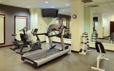 Fitness center at Holiday Inn Conference Center Edmonton South.