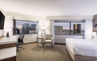 Day use room with TV, work desk and private bathroom at Delta Hotel By Marriott Regina.