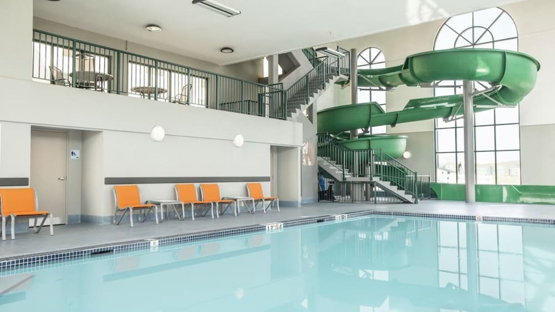 Indoor pool with water slide at Holiday Inn Express & Suites Medicine Hat.