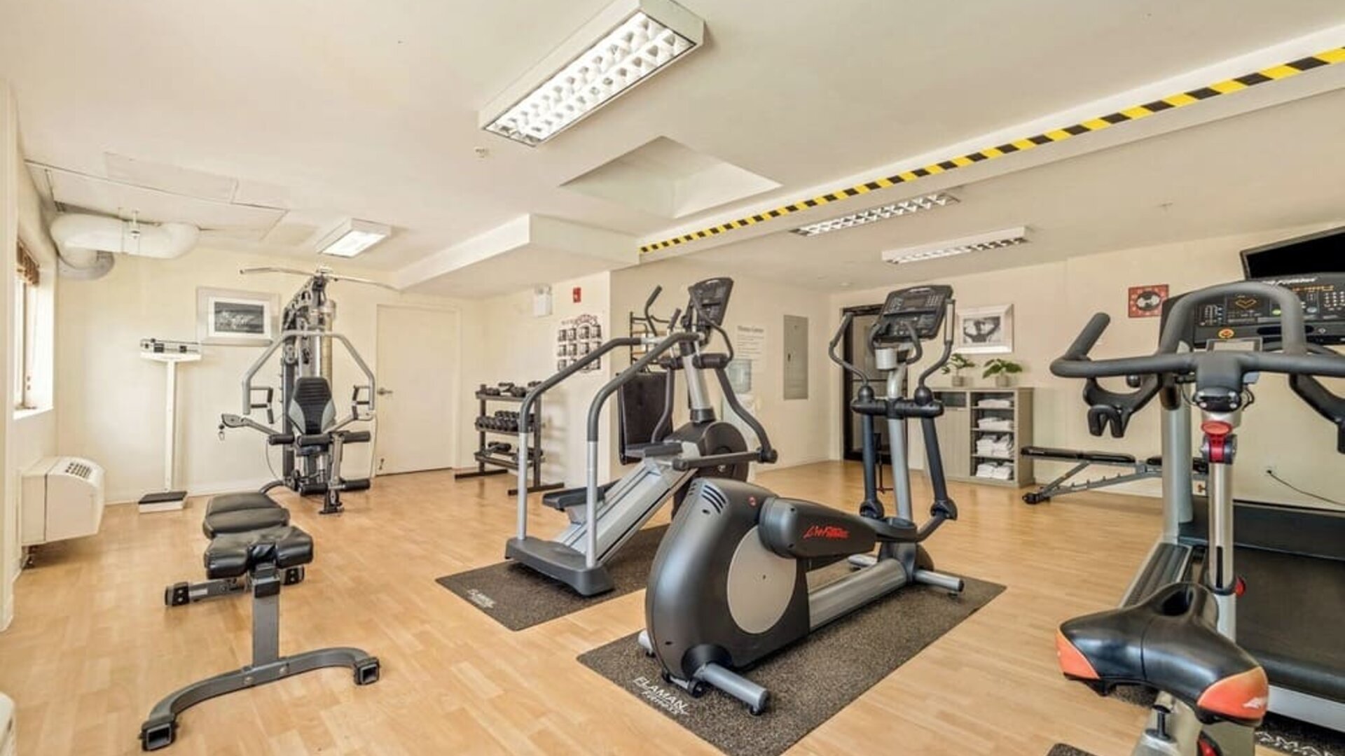Fully equipped fitness center at Holiday Inn Lethbridge. 