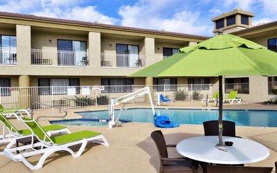 Sun loungers beside the pool at Spark By Hilton Fountain Hills Scottsdale.
