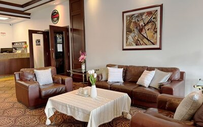 Comfortable lobby lounge at Divya Sutra Plaza & Conference Centre.
