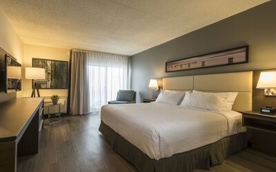 Bright and spacious day use room with work desk at Rodd Miramichi River.