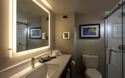Guest bathroom with shower and free toiletries at Atlantica Hotel Halifax.