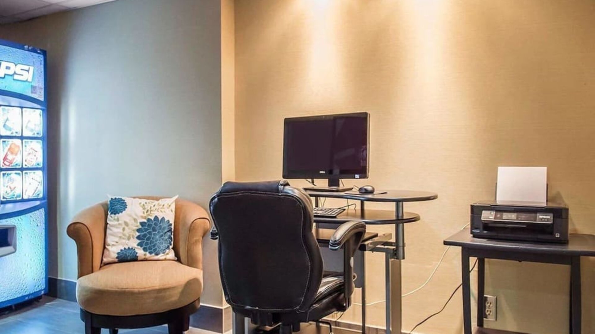 Business center with computer, printer and ergonomic chair at Comfort Inn Pembroke.