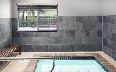 Indoor spa tub at Garner By IHG.