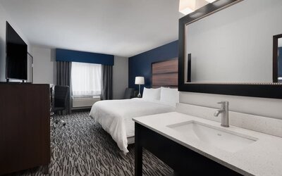 Day use room with work desk at Garner By IHG.