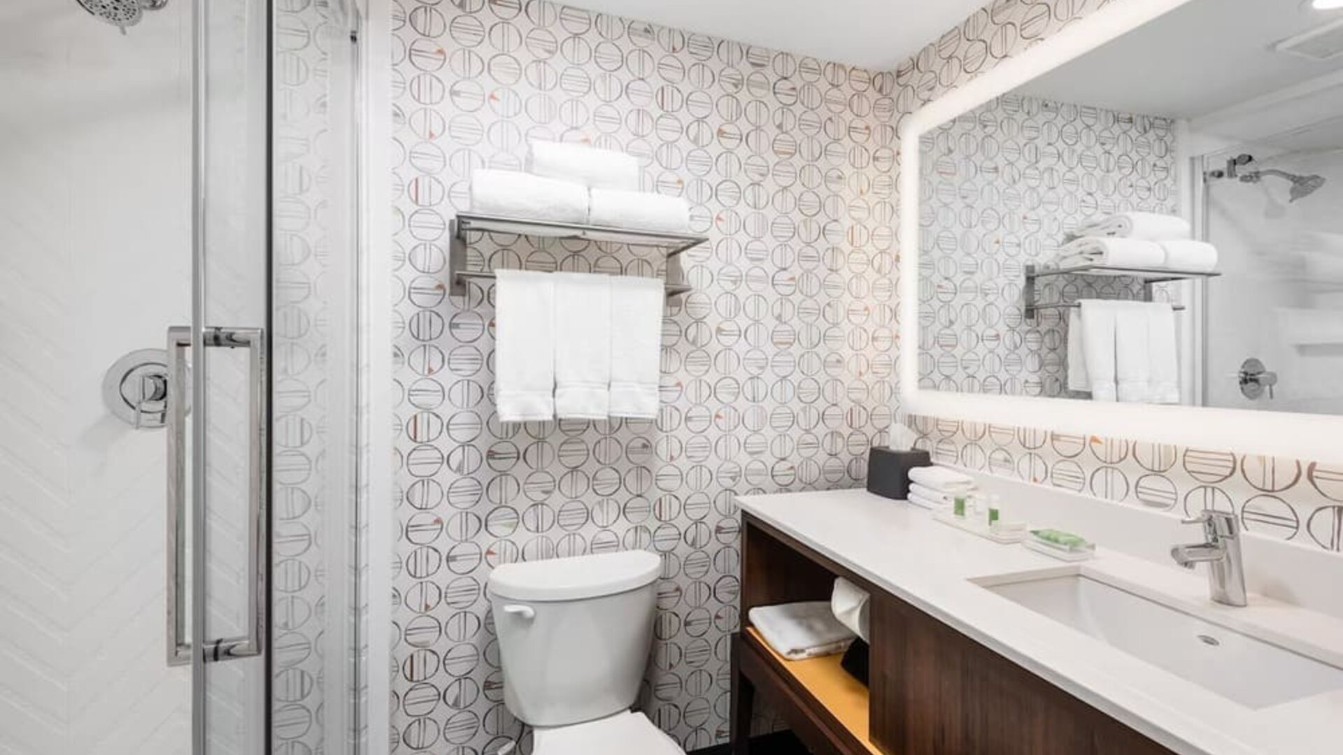 Guest bathroom with shower and free toiletries at Holiday Inn Toronto Airport East.