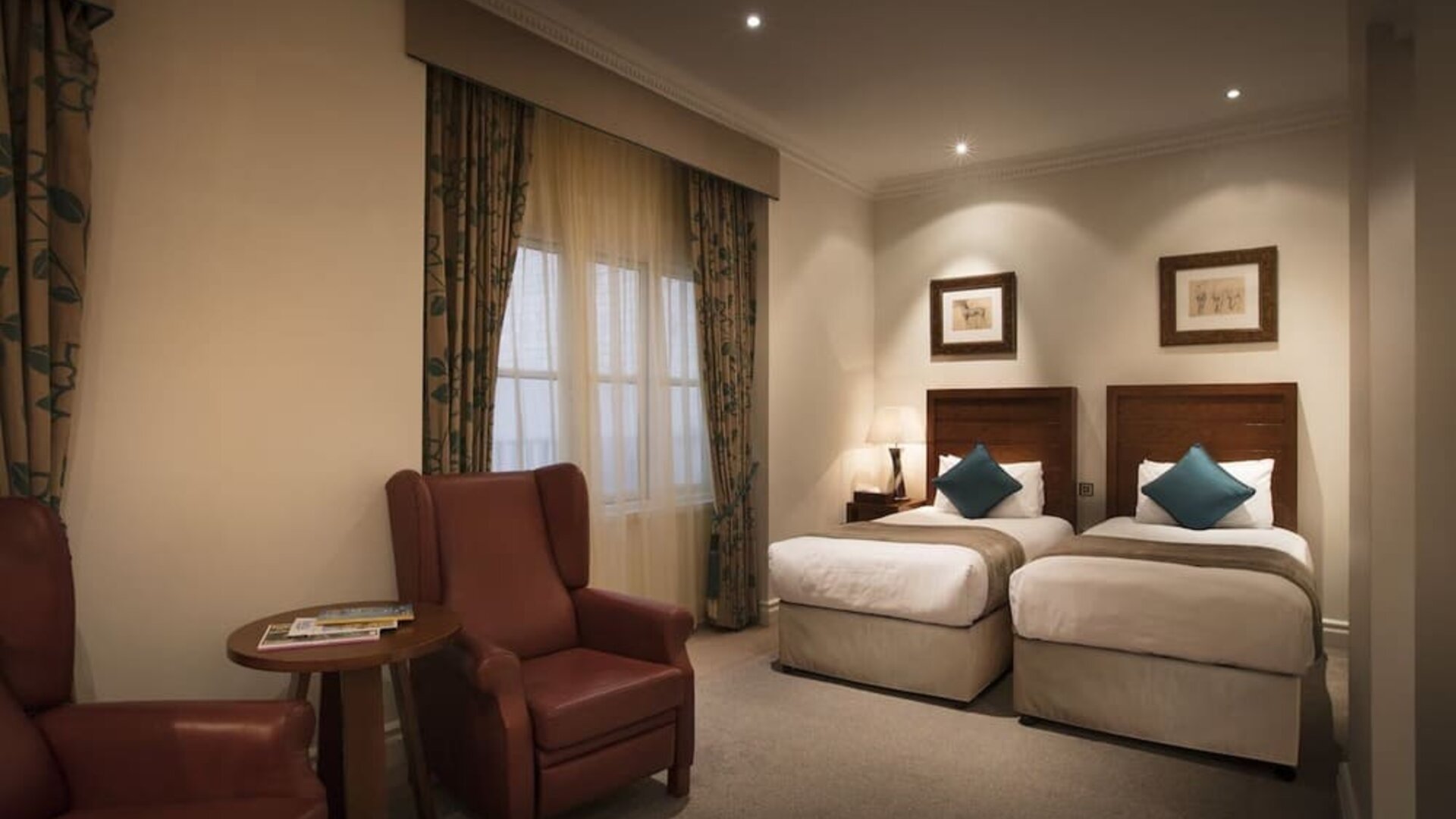 Day use twin room with lounge area at The Royal Horseguards Hotel.