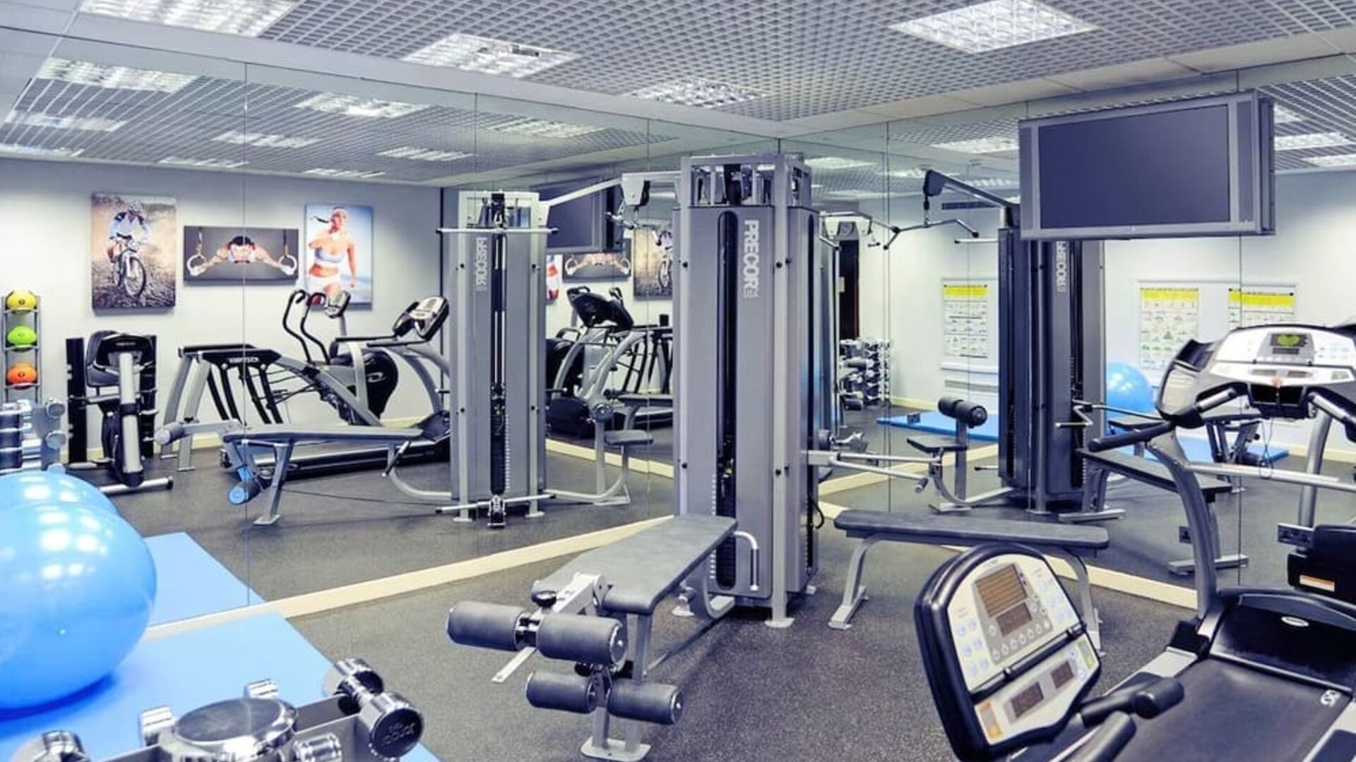 Fully equipped fitness center at Mercure Hotel London Paddington.