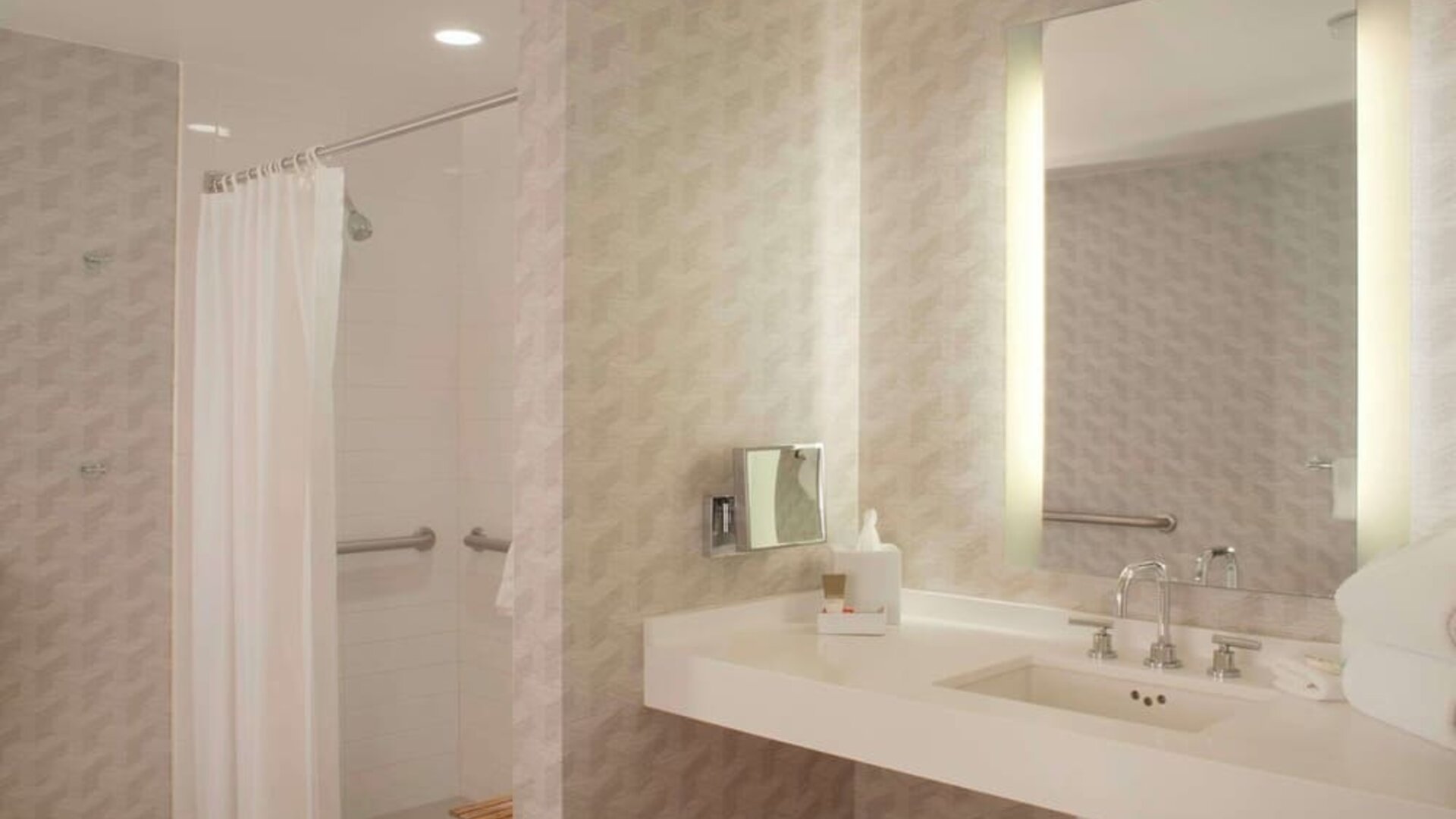 Guest bathroom with shower at Hyatt Regency Los Angeles International Airport.