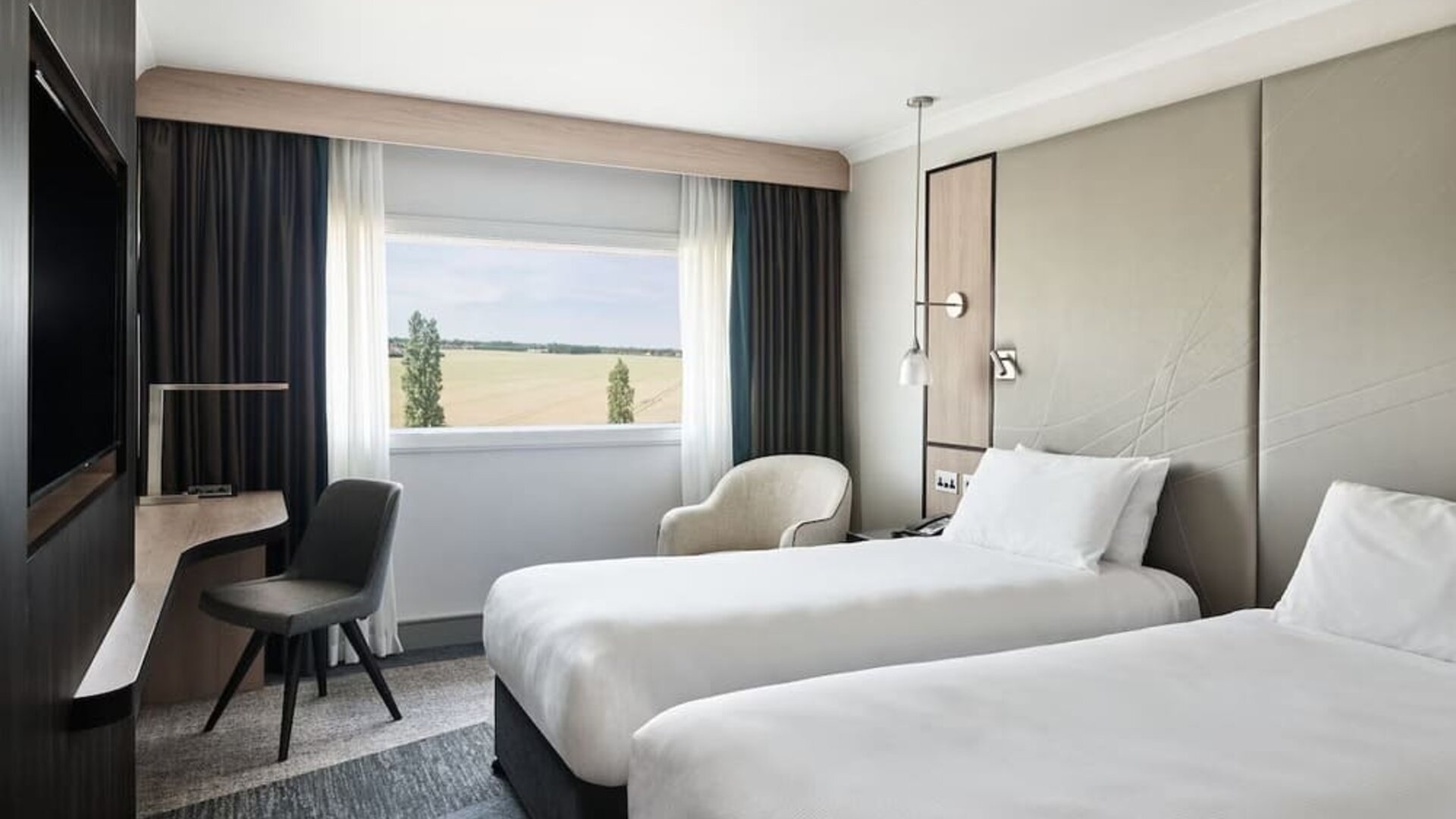 Day use twin room with work desk at Hyatt Place London Heathrow Airport.