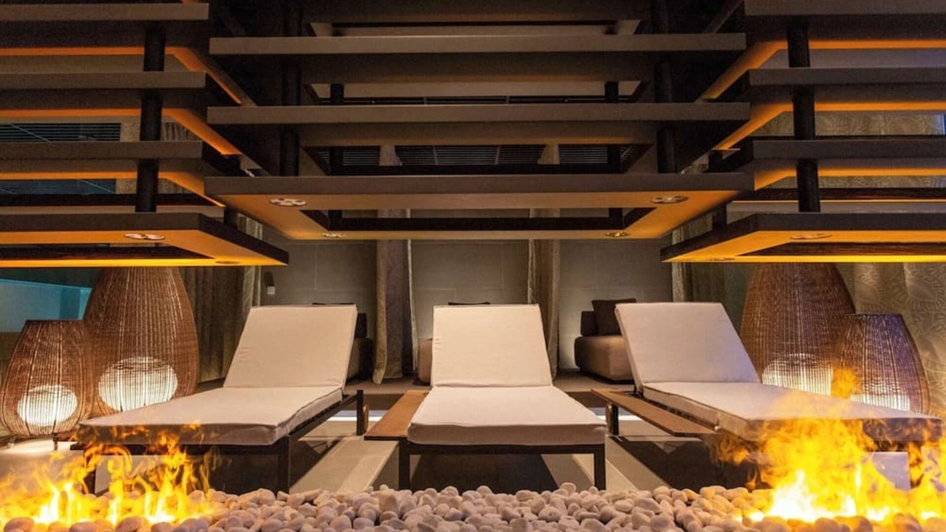 Lounge chairs and fire pit at Keight Hotel Opatija.