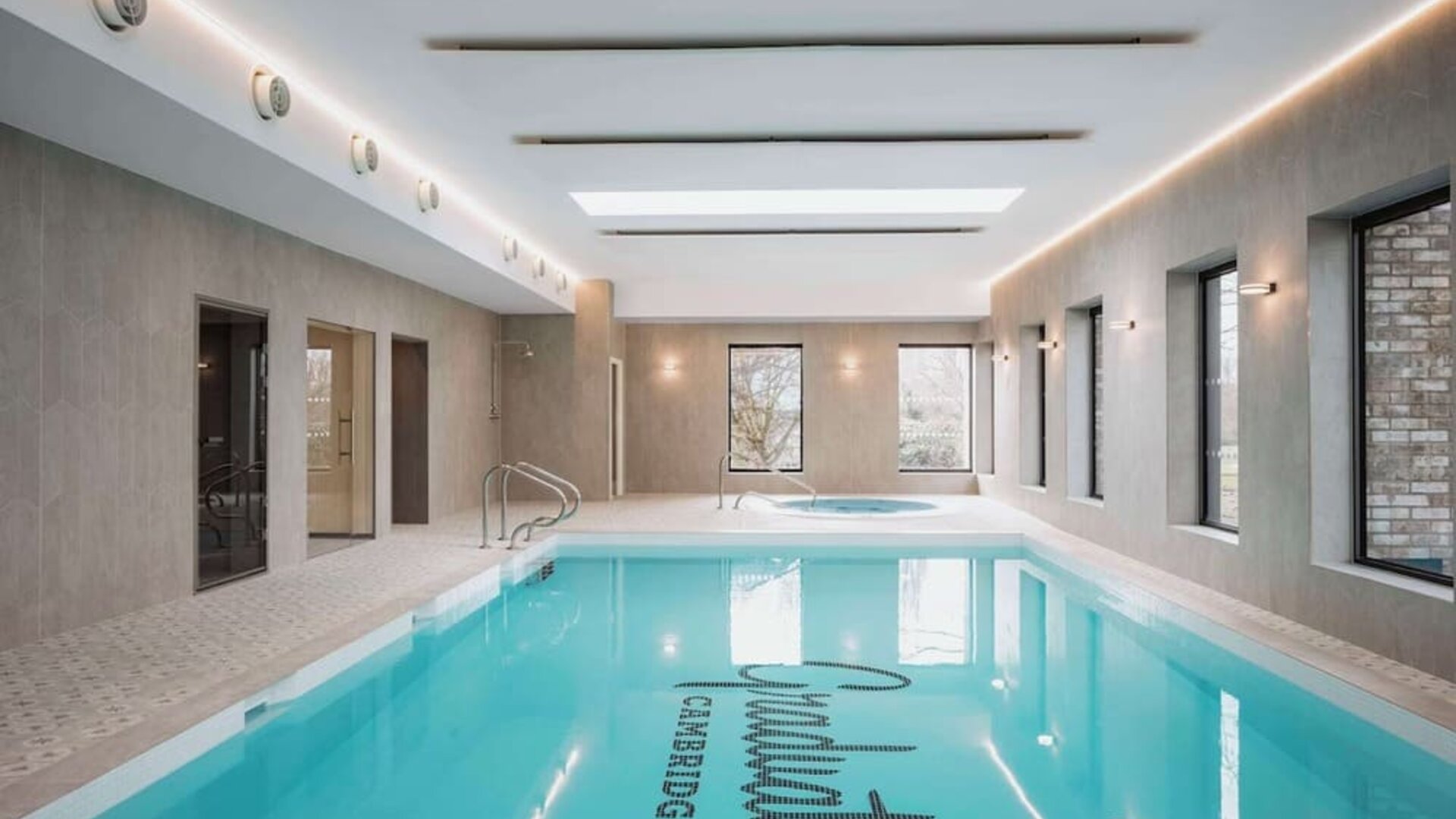 Indoor pool at Graduate By Hilton Cambridge.